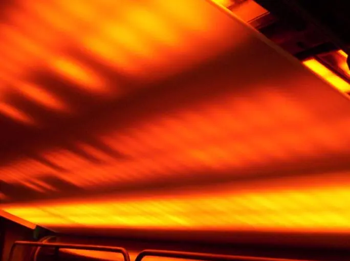 Close-up of an orange glowing heated surface